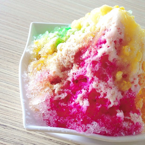 The evaporated or condensed milk is then sprinkled on top, with red rose syrup and Sarsi syrup to produce the multicolored effect, Singapore Foods