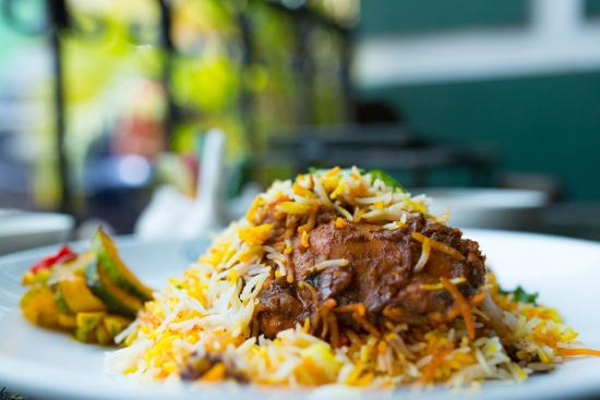 Majestic portraits of sultans embellish the walls of the Islamic restaurant, Singapore Food